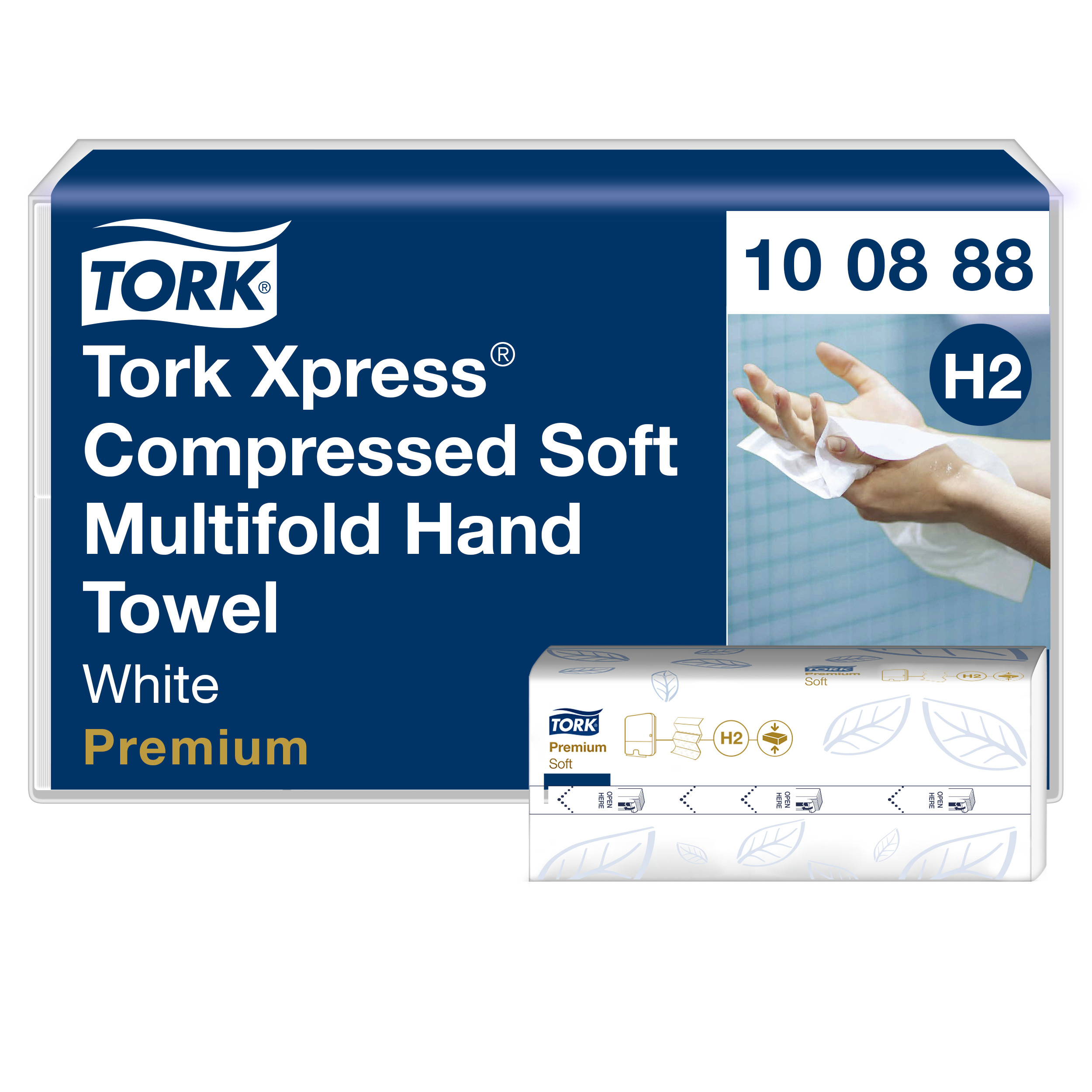 Tamsiai mėlyna Tork Xpress Compressed Soft H2 pakuotė ir priekyje padėtas baltų lankstytų rankšluosčių pakelis