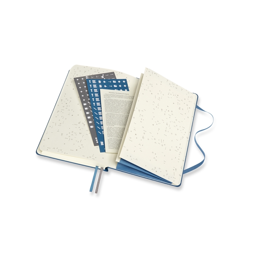 Moleskine Book Journal su simboliais margintais lapais, trimis lipdukų lapais, tekstiniu lapeliu ir dviem žymekliais