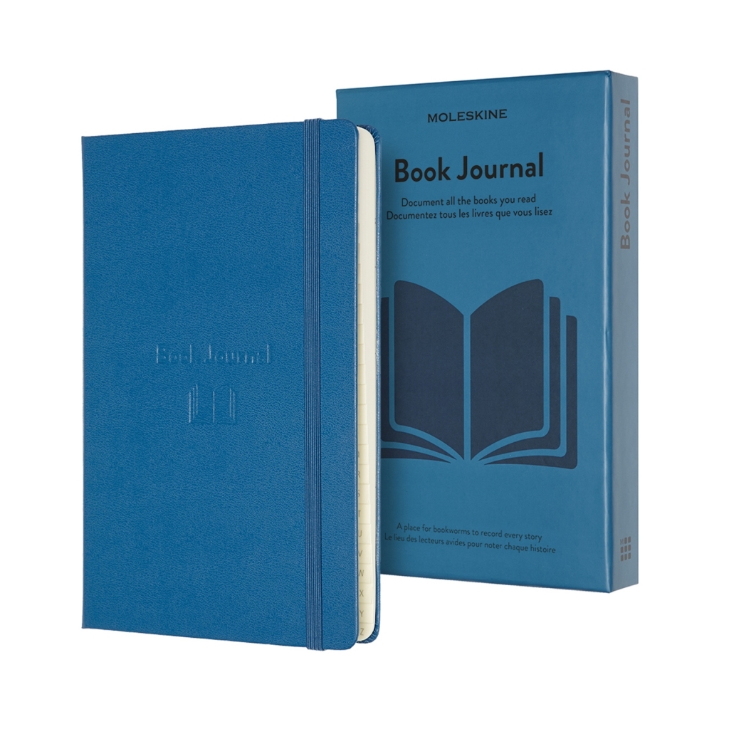 Mėlynas Moleskine Book Journal su tekstūriniu viršeliu, elastine juosta, kreminiais lapais ir atversta knyga pažymėta dėžute